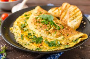 Omelette On Plate Cooked By Catering Chef